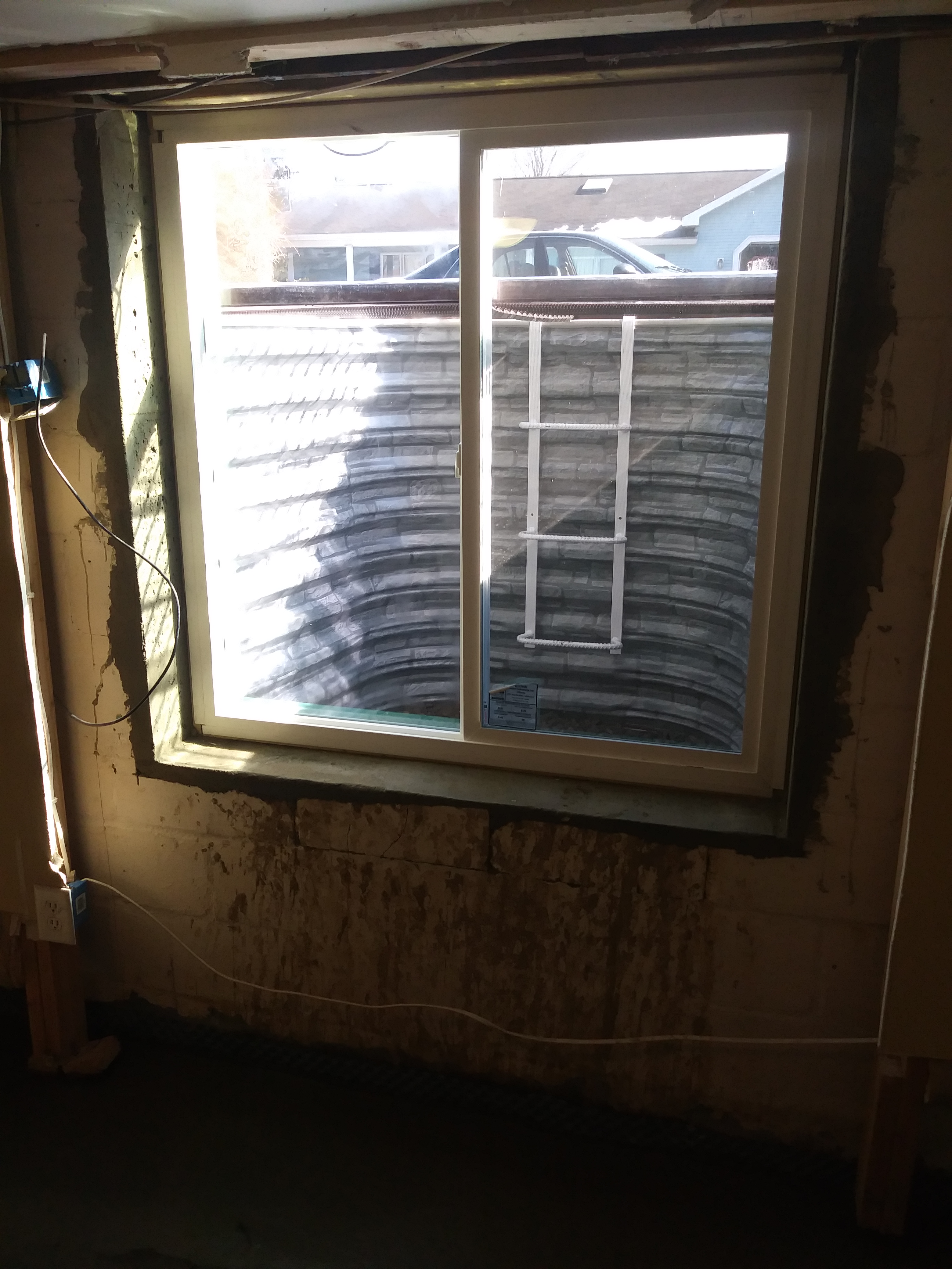 Egress window installation for code compliance