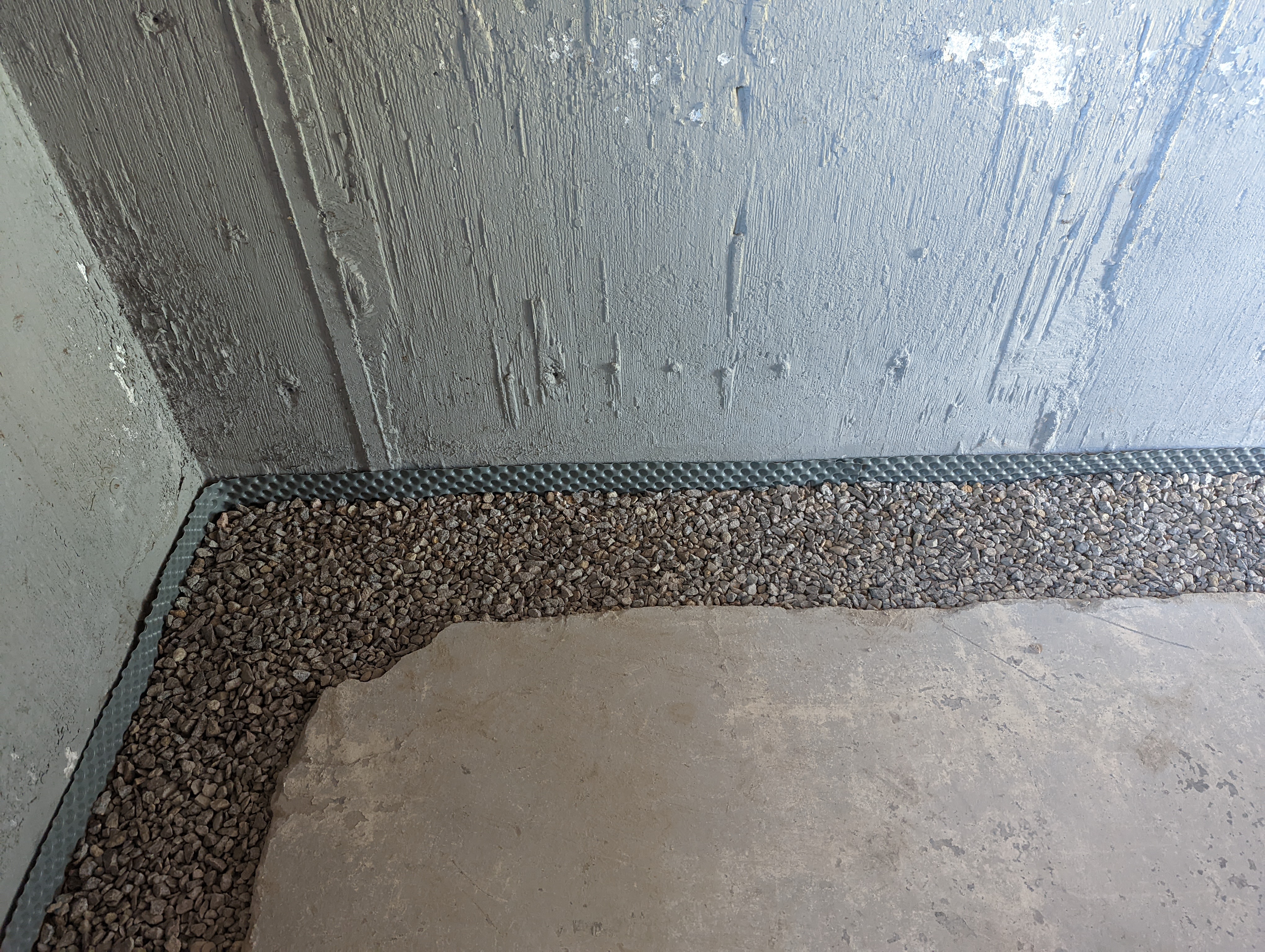 Footing drain with pipe and stone